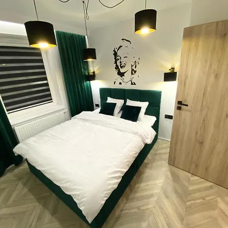 Апартаменты Apartament Z Ogrodkiem Szczytno Mazury Щитно