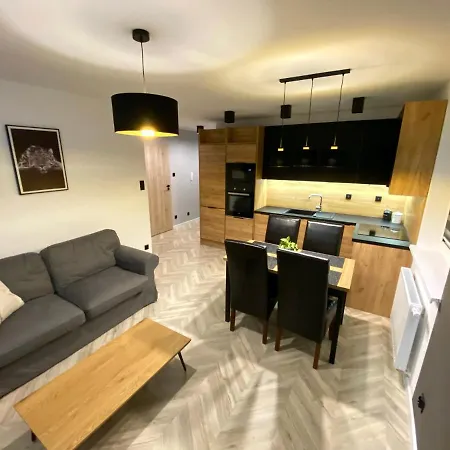 Апартаменты Apartament Z Ogrodkiem Szczytno Mazury